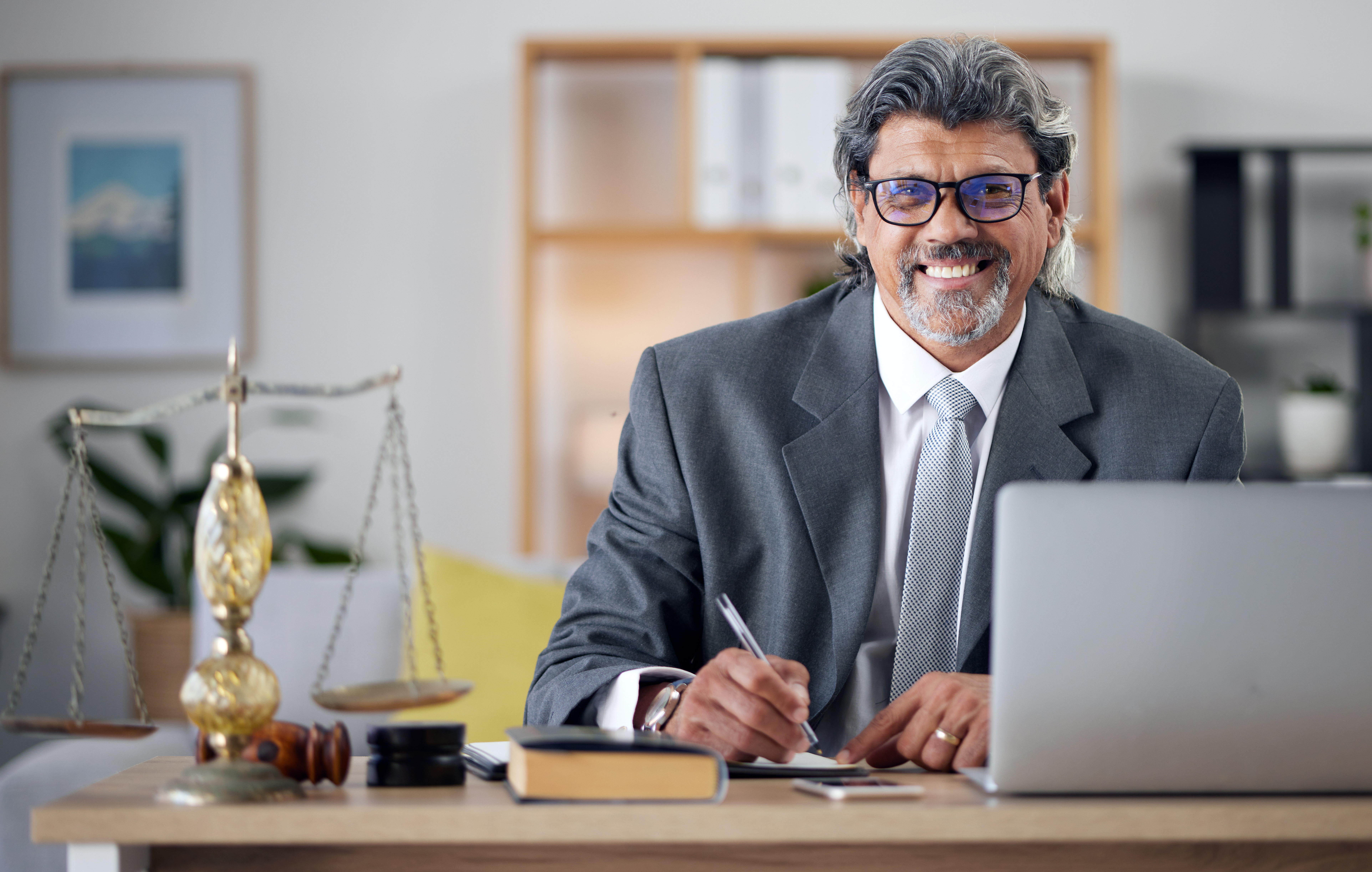 Justice, lawyer and portrait in office with laptop for working in law firm, court research or searc.